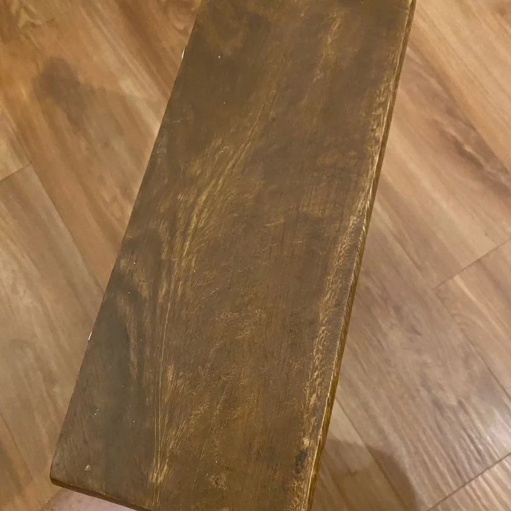 Brown and black iron and wood wall shelf